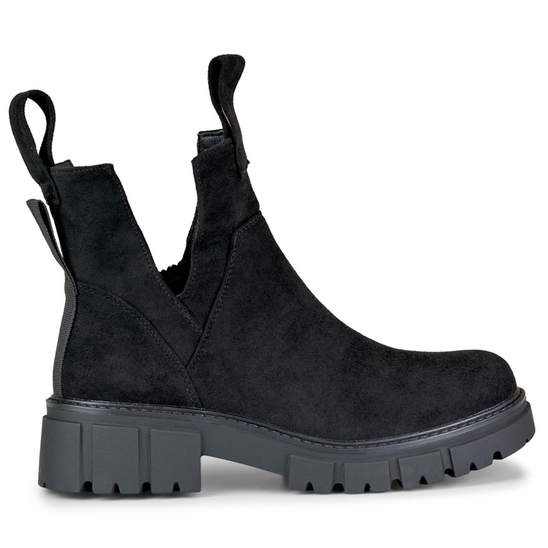 Kvinnors svarta stövlar på plattformen