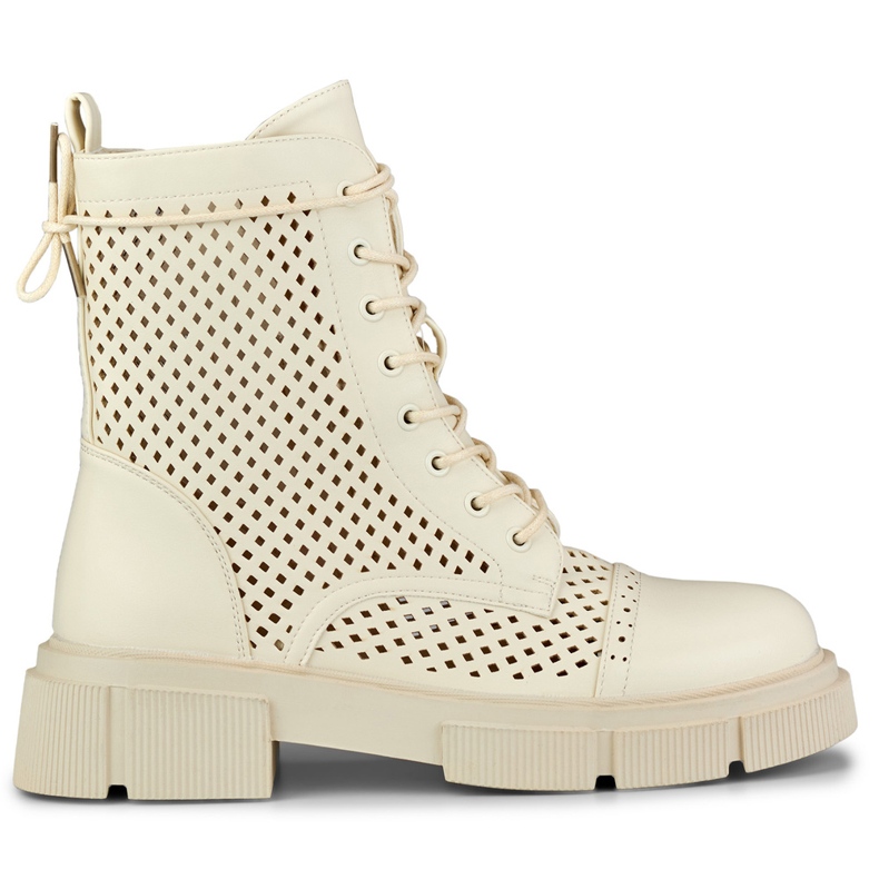 Genombrutna beigesnörade damstövlar