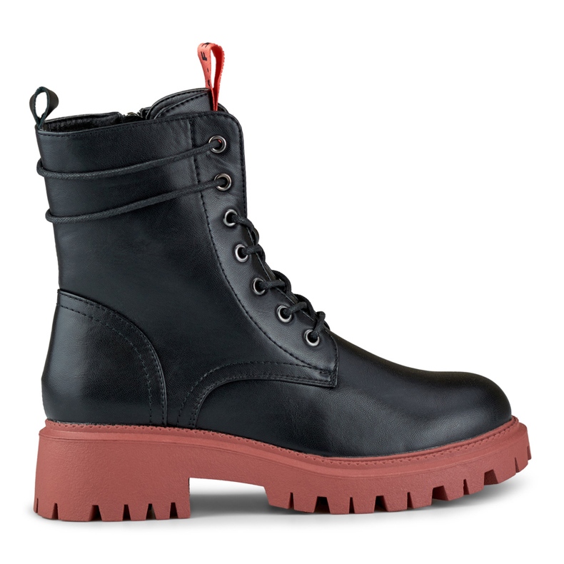 Kvinnors svarta arbetare med ett färgglatt tillägg