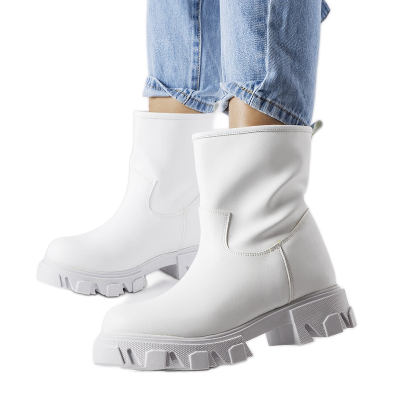 Vita slip-on arbetarskor från Wuori