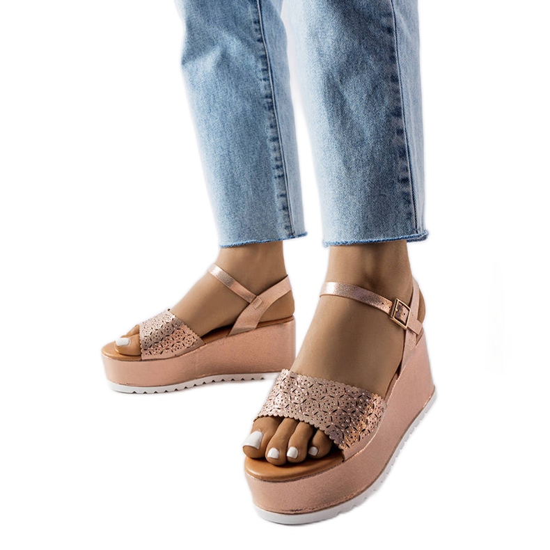 Rosa genombrutna platåsandaler från Stockton