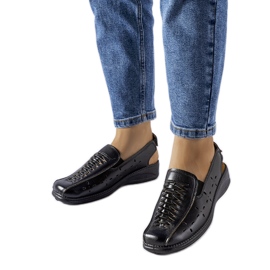 Svarta Glafi genombrutna sandaler