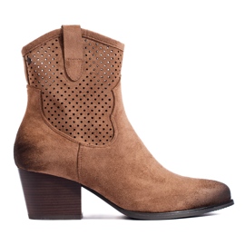 Genombrutna beige cowboyboots med hög klack från Vinceza