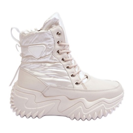 Isolerade stövlar på en massiv plattform, ljusbeige Lanleh