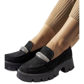 Svarta mockasiner med en massiv Macario-sula