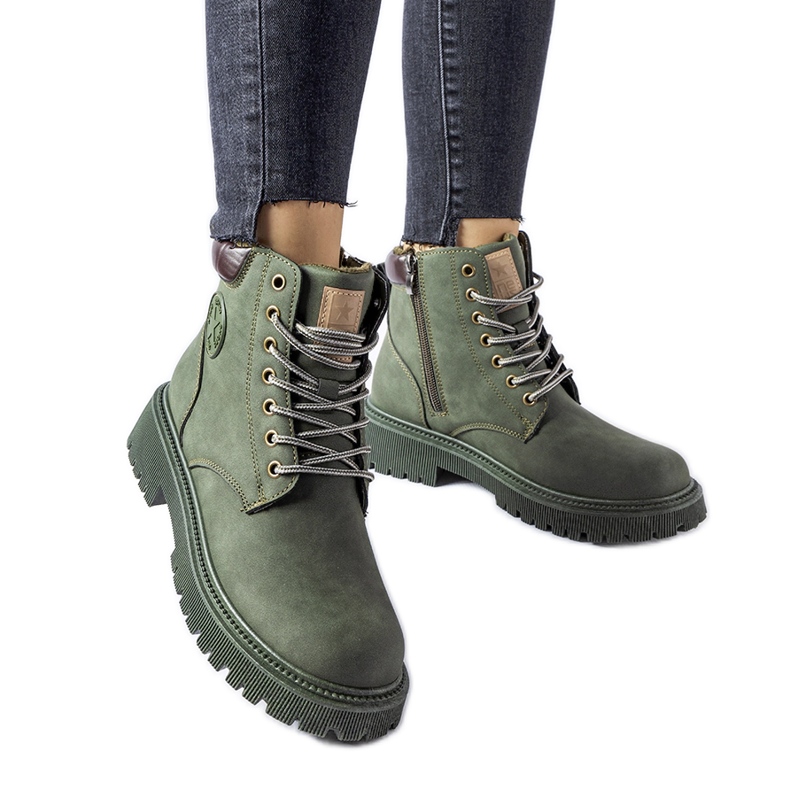 Gröna isolerade Doutor stövlar