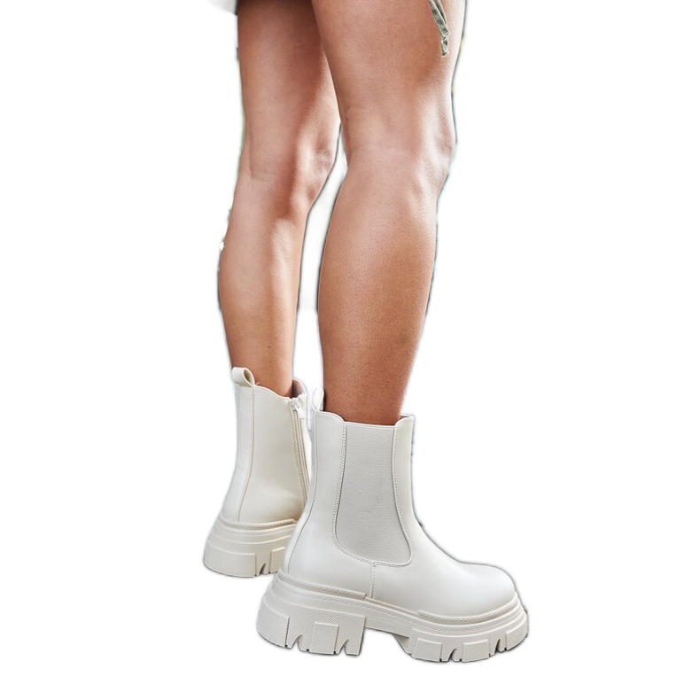 Krämfärgade ankelstövlar med gummiinlägg D'Isola beige