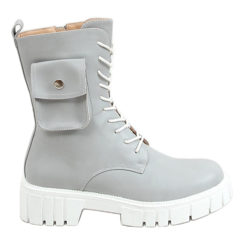 Arbetare med en Maruna L. GRÅ handväska