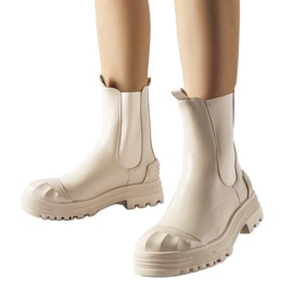 Beige isolerade massiva ankelboots från Albanese