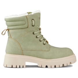 Ljusgröna isolerade damstövlar