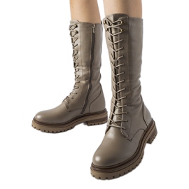 Bruna montepianoarbetare med hög snörning