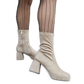 Beige högklackade Haven stövlar