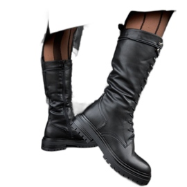 Svarta montepianoarbetare med hög snörning