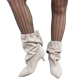 Låga slip-on stövlar i beige ekomocka