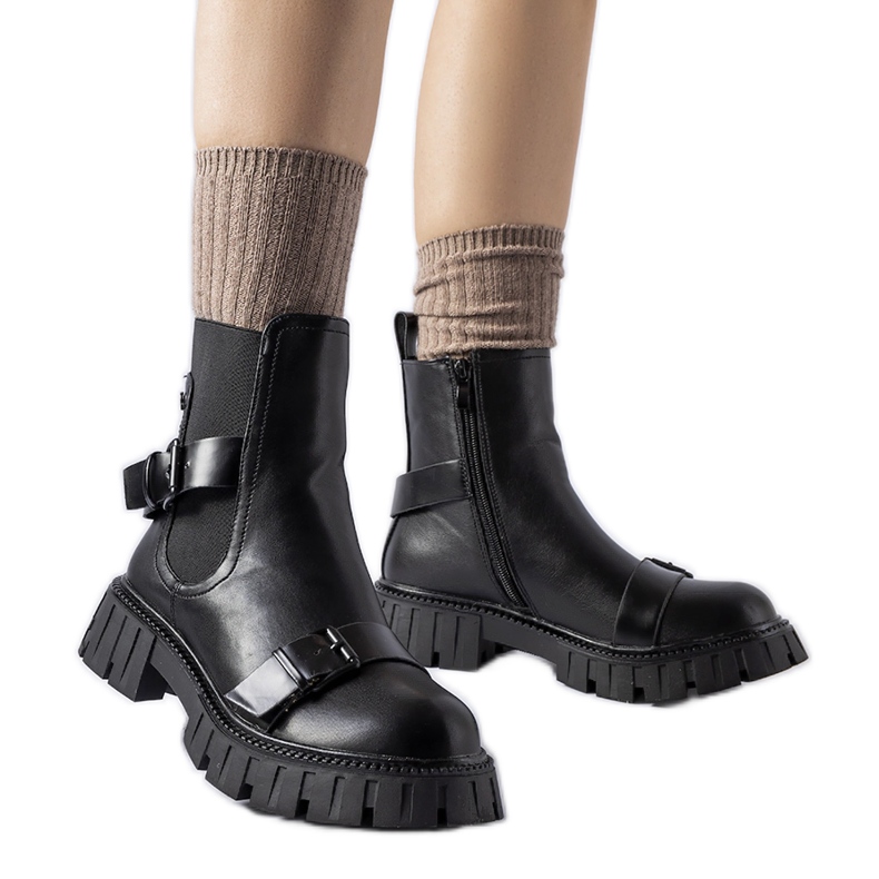 Svarta ankelboots med massiv Fontarine-sula