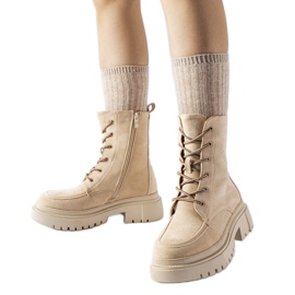 Beige sneakers med massiv Riel-sula