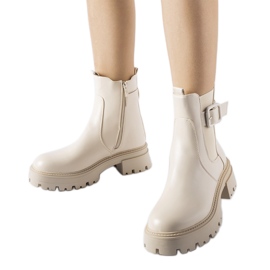 Beige isolerade ankelboots med Casola-spänne
