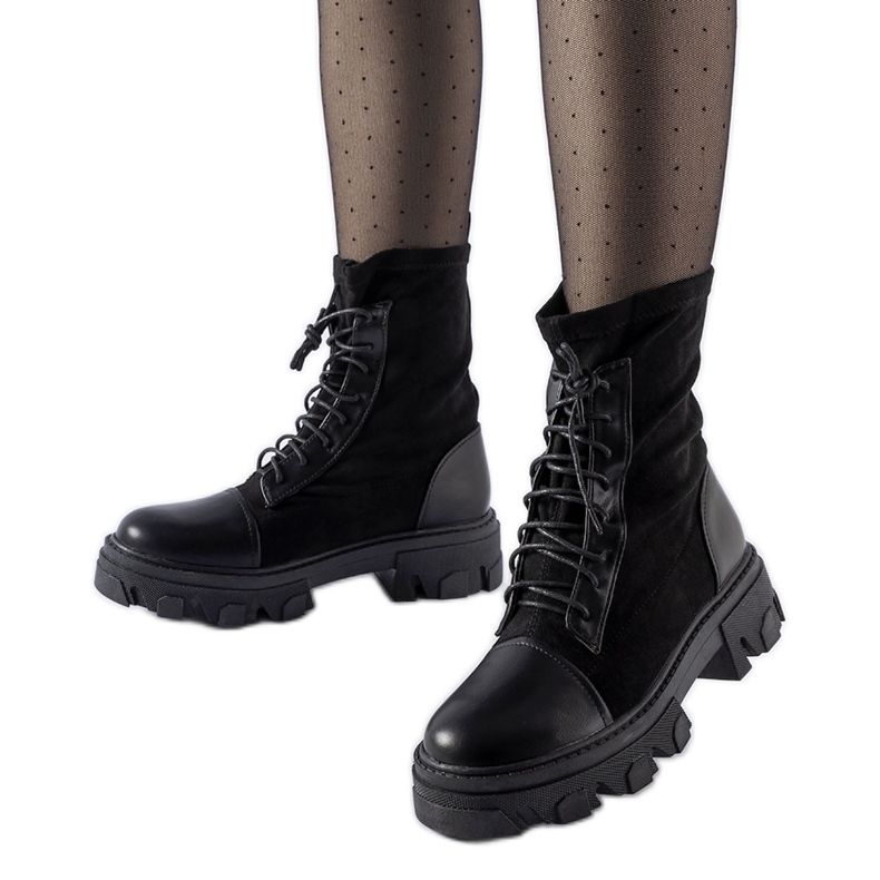 Svarta slip-on arbetare med Tarces bindning