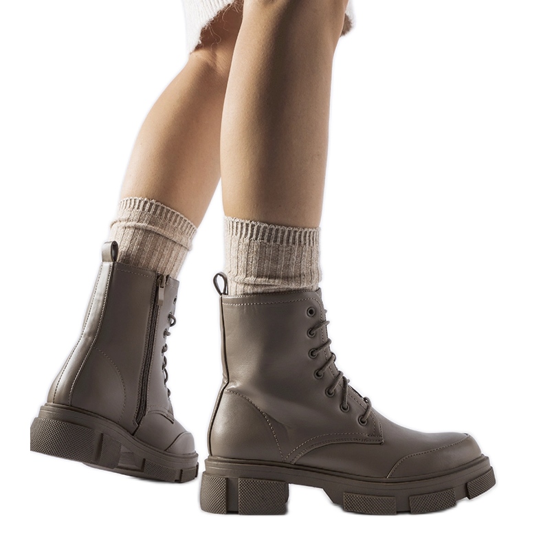 Grå och bruna isolerade Cunningham arbetare