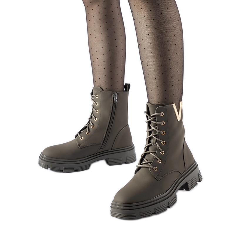 Mörkgröna isolerade matta Fru fotkängor