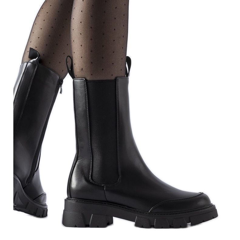 Svarta massiva isolerade Morbello stövlar