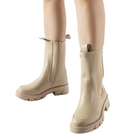 Beige massiva isolerade Morbello ankelstövlar