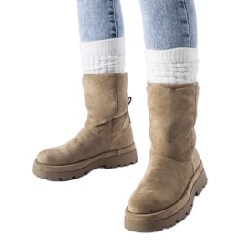 Bruna isolerade stövlar med massiv Flavia-sula