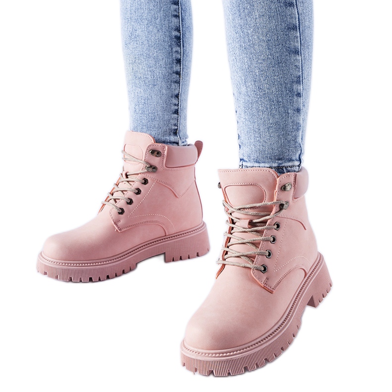 Ljusrosa isolerade Aranova-arbetare med snörning