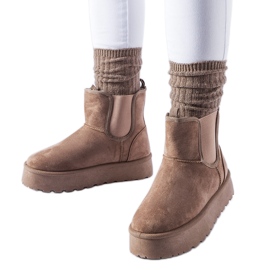 Bruna snöstövlar med resårband på sidorna från Bertino