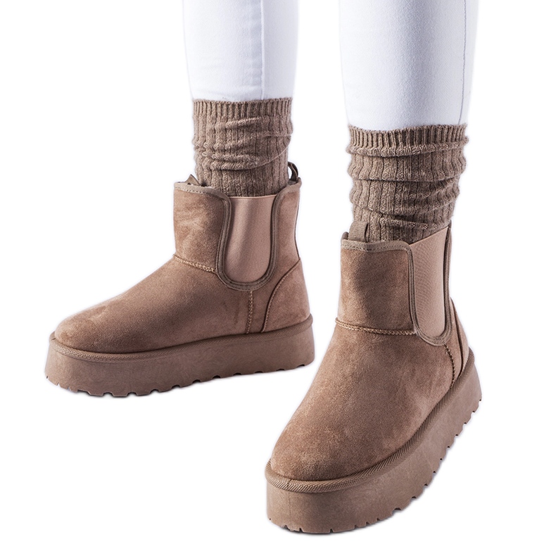 Bruna snöstövlar med resårband på sidorna från Bertino