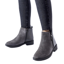 Grå ankelboots gjorda av kombinerade material Sees