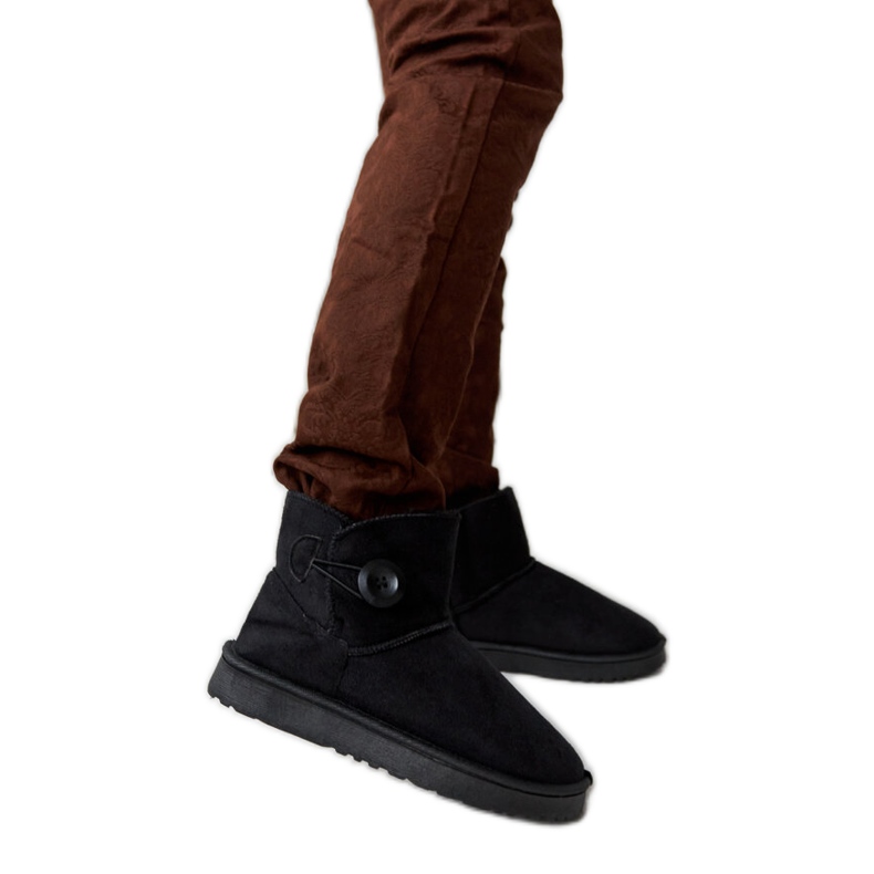 Snyder svarta korta isolerade snöstövlar