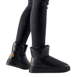 Svarta isolerade Kaufman snöstövlar i ekoläder