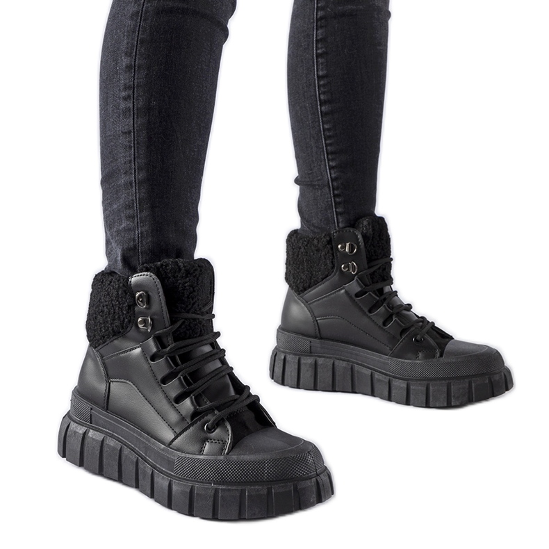 Svarta isolerade Adamsville sneakers