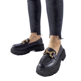 Svarta loafers dekorerade med Uzzone-rhinestones