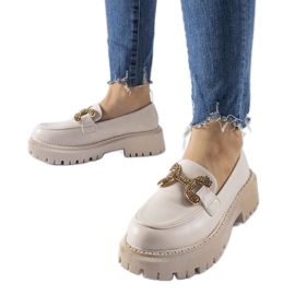 Beige mockasiner dekorerade med Uzzone strass