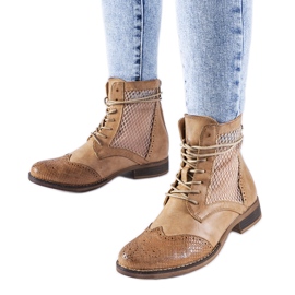 Bruna genombrutna platta stövlar från Reeves