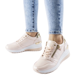 Beige sneakers dekorerade med Marietta-dragkedja