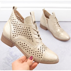 Genombrutna ankelstövlar i guld för kvinnor Potocki SZ12091 beige