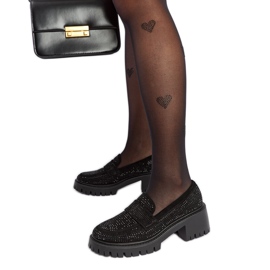 Svarta mockasiner med en massiv föräldraklack