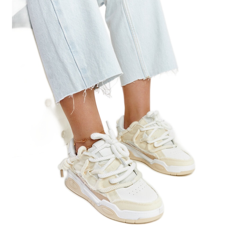 Beige sneakers med Melilot-tyginlägg