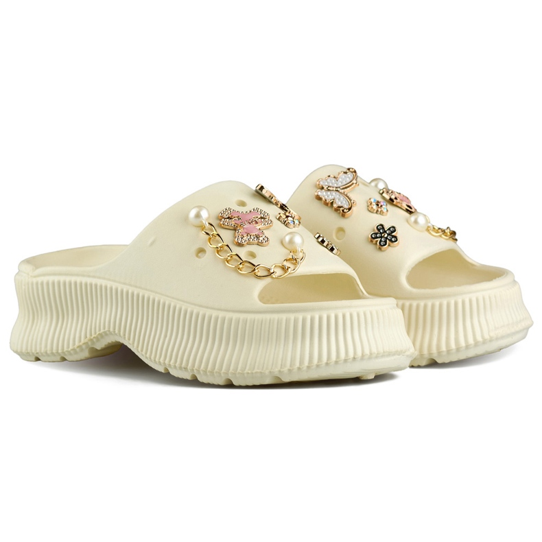Beige gummiflipflops för kvinnor med dekorationer