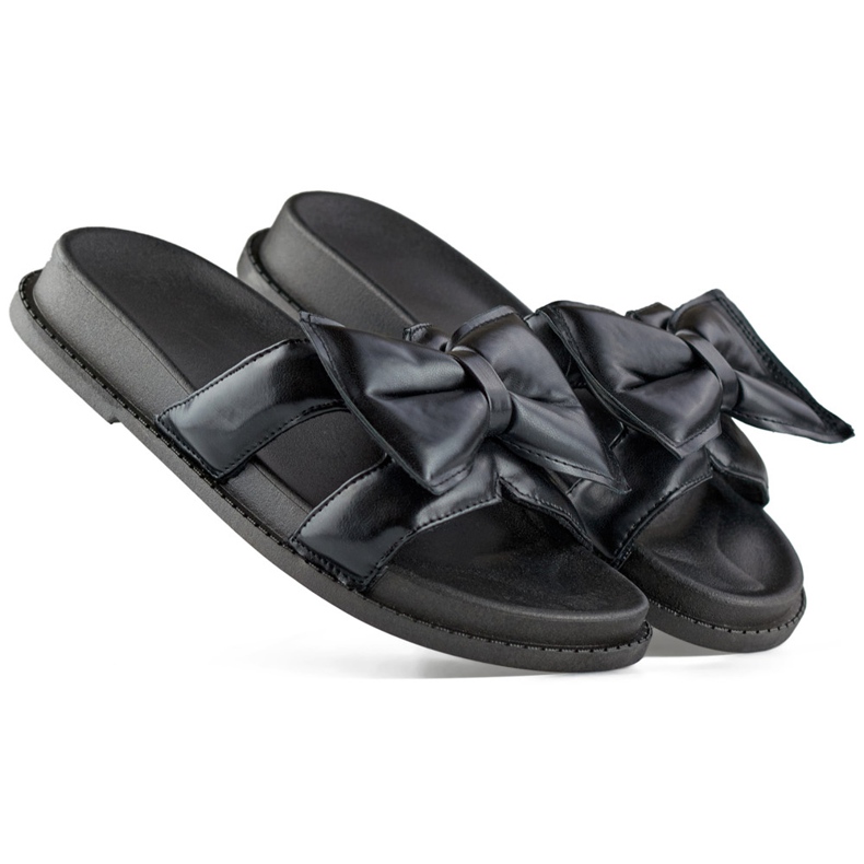 Svarta damtofflor med rosett av ekologiskt läder