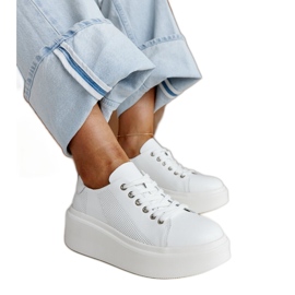 Blå läderskor med dekorativt spänne vit