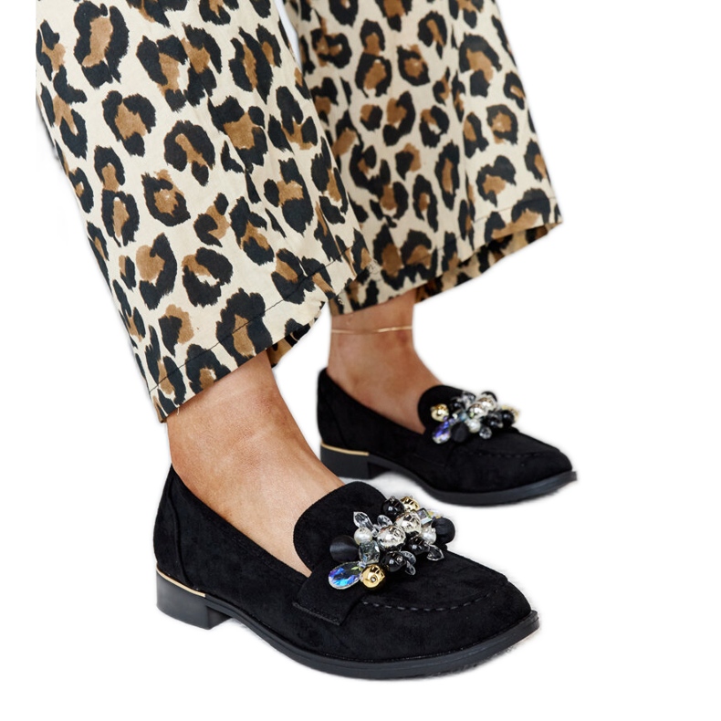 Svarta mockasiner med Dahera-dekorationer