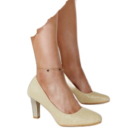Guld glänsande pumps med Antibies lädersula gyllene