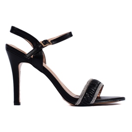 Svarta eleganta högklackade damsandaler