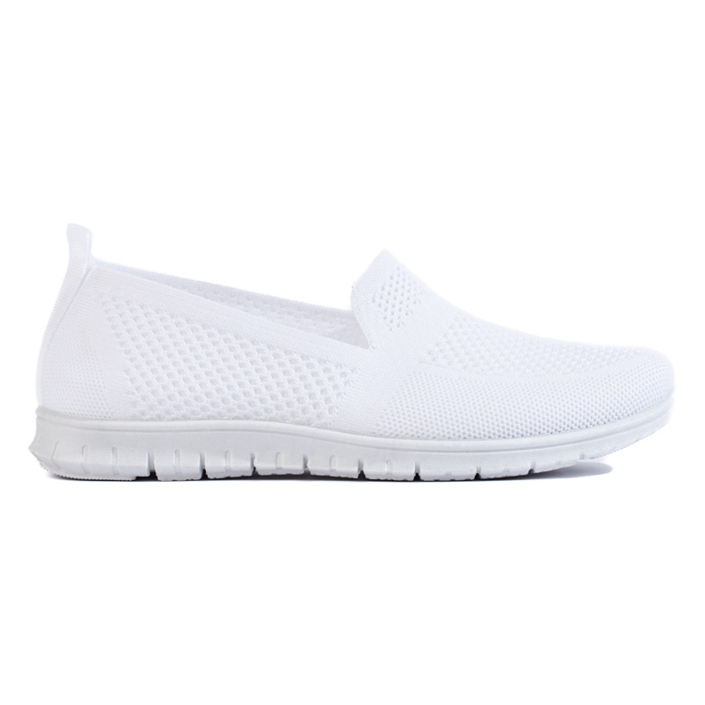 Ta på dig vita sneakers