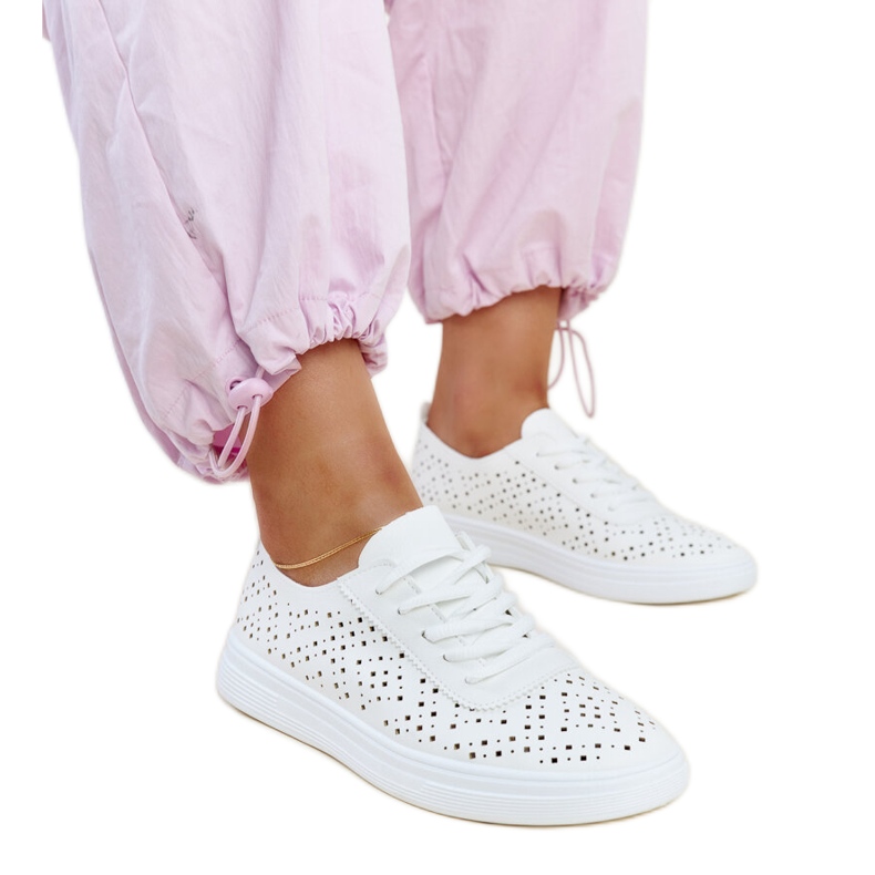Vita genombrutna Manoek sneakers