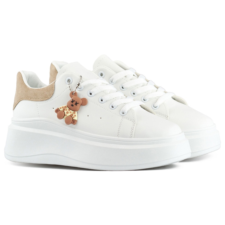 Vita sportskor med tjock sula och beige nalle